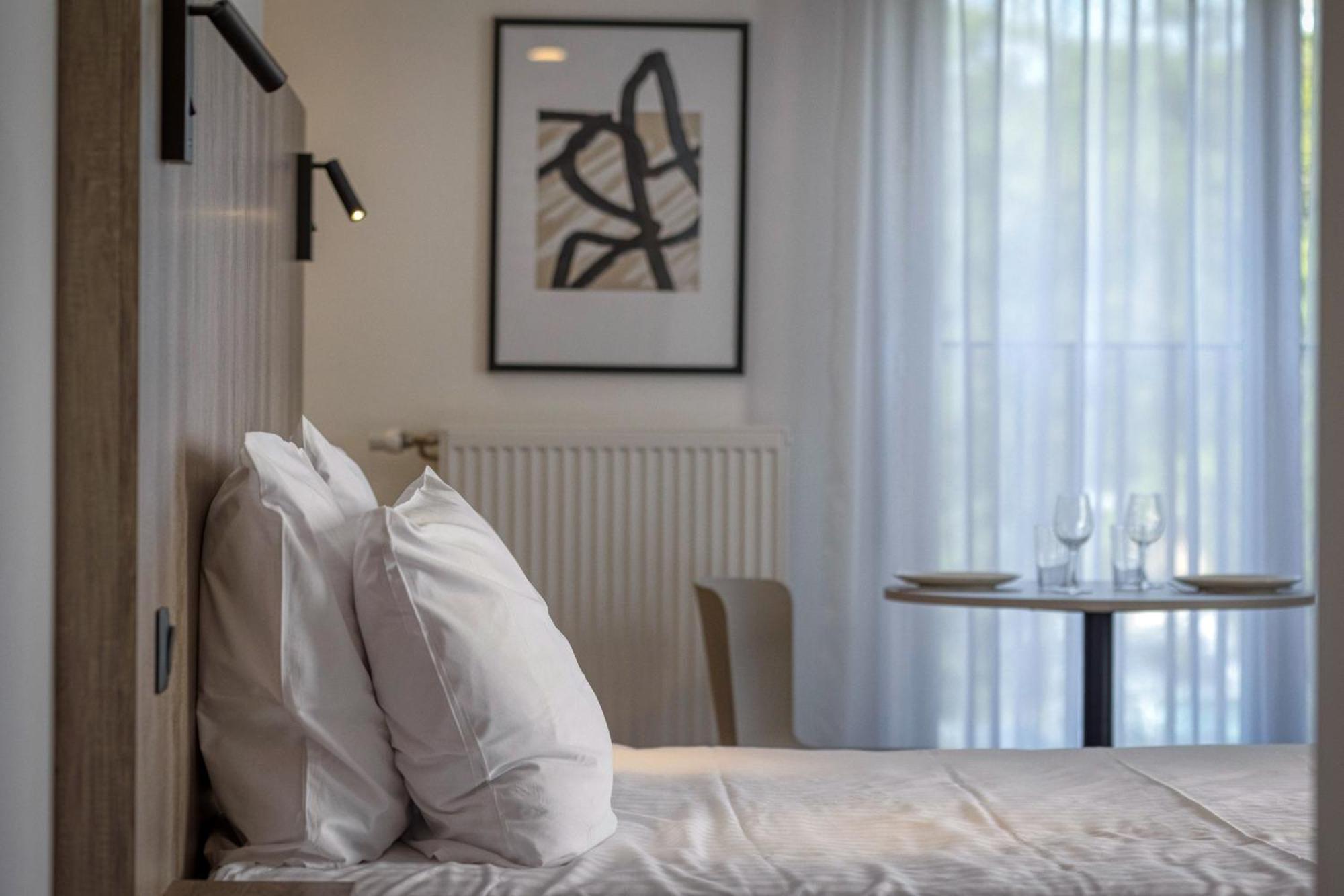 אקס-לה-באינס Kosy Appart'Hotels - Residence Du Lac מראה חיצוני תמונה