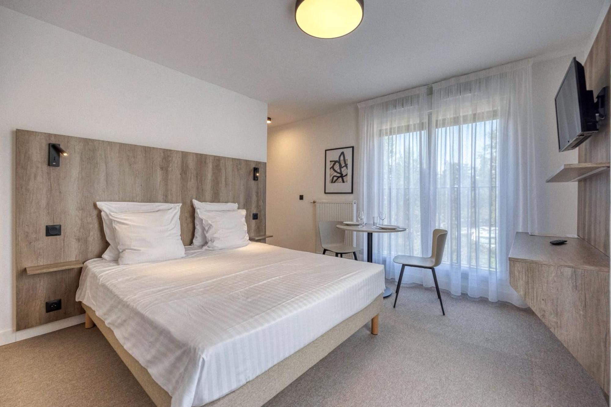 אקס-לה-באינס Kosy Appart'Hotels - Residence Du Lac מראה חיצוני תמונה